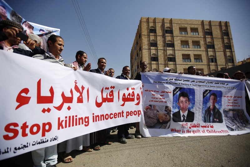 Yemenis gather in front of a U.N. building during a protest against the Saudi-led coalition in Sanaa, Yemen, Monday, Feb. 15, 2016. CREDIT: AP PHOTO/HANI MOHAMMED