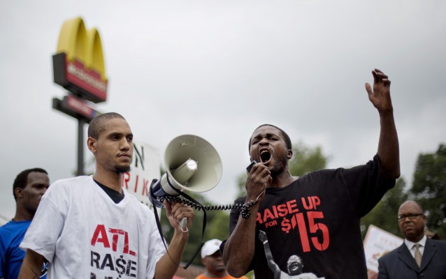 Fast food workers protest in Atlanta in 2014 CREDIT: AP Photo/David Goldman