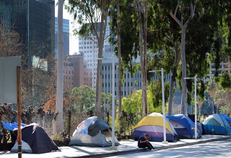 Homeless people’s tents lining the streets in downtown Los Angeles CREDIT: AP PHOTO/RICHARD VOGEL