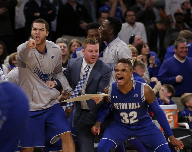 Seton Hall’s Derrick Gordon (32) celebrates with teammates after Isaiah Whitehead (15) made the game winning shot against Villanova during the Big East men’s tournament Saturday, March 12, 2016, in New York. CREDIT: FRANK FRANKLIN II, AP