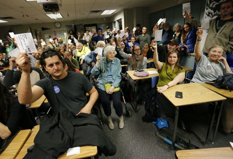 2016 Democratic caucus in Boulder, CO CREDIT: AP PHOTO/BRENNAN LINSLEY