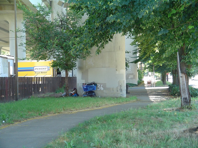 A homeless man under a bridge in Portland, OR CREDIT: FLICKR/BORN1945