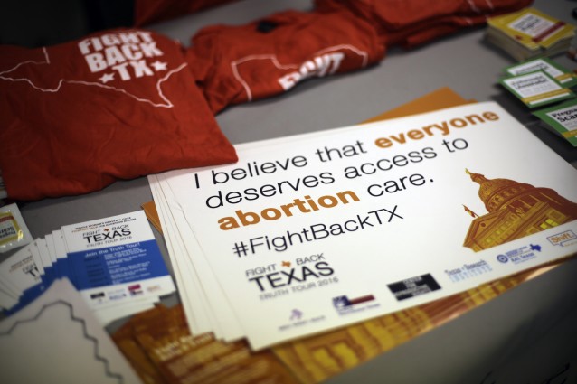 T-shirts are handed out during a tour at Whole Woman’s Health of San Antonio. CREDIT: AP Photo/Eric Gay