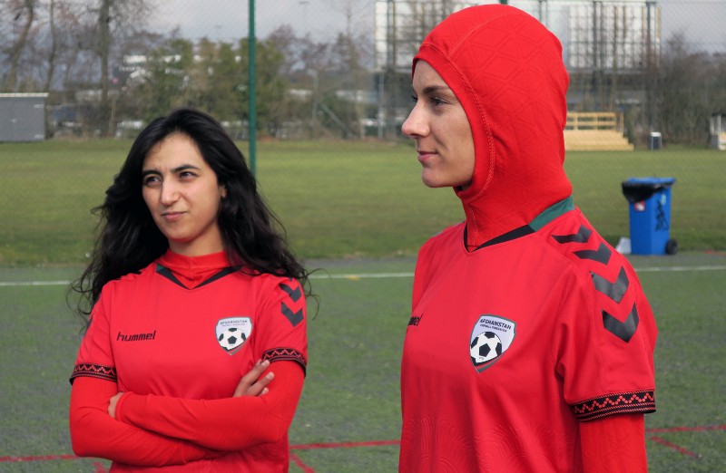 Afghani national soccer team player Shabnam Mabarz, right, wearing the new head-to-toe outfit with an integrated hijab, stands next to Khalida Popal, the former Afghanistan national women’s team captain, in Copenhagen on Tuesday, March 8, 2016. CREDIT: JAN M. OLSEN, AP