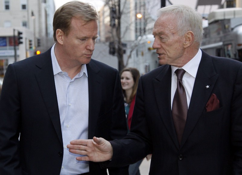 Roger Goodell, NFL commissioner, left, and Jerry Jones, owner of the Dallas Cowboys talk. CREDIT: ALEX BRANDON, AP