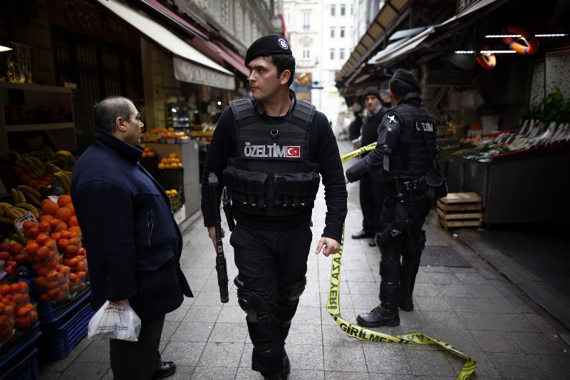 Security forces secure the area near the scene of an explosion in Istanbul, Turkey, Saturday, March 19, 2016. An explosion on Istanbuls main pedestrian shopping street on Saturday has killed a number of people and injured over a dozen others. CREDIT: AP PHOTO/EMRAH GUREL