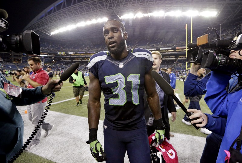 Seattle Seahawks strong safety Kam Chancellor walks off the field after the Seahawks beat the Detroit Lions 13–10 in an NFL football game, Monday, Oct. 5, 2015, in Seattle. CREDIT: ELAINE THOMPSON, AP