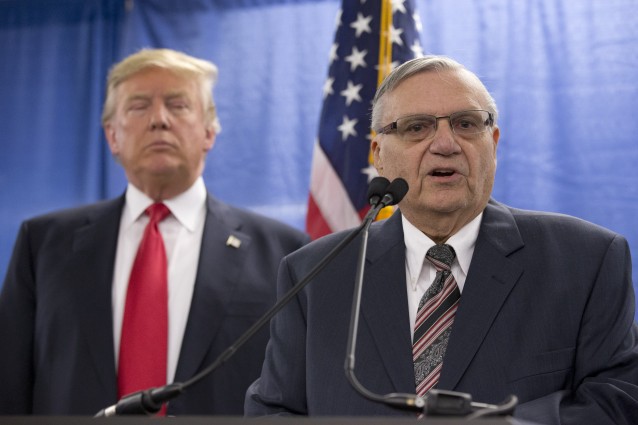 Republican presidential candidate Donald Trump, left, is joined by Maricopa County, Ariz., Sheriff Joe Arpaio during a news conference at the Roundhouse Gymnasium, Tuesday, Jan. 26, 2016, in Marshalltown, Iowa. (AP Photo/Mary Altaffer) CREDIT: AP Photo/Mary Altaffer
