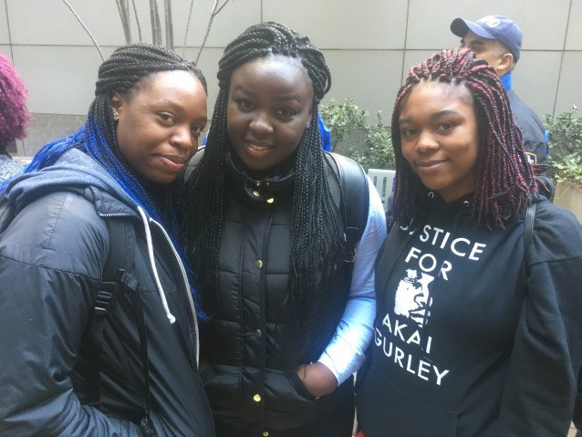 Gurley’s cousins, including Mesha Joseph (center) and Znobia Spears (right), at the New York rally. CREDIT: Kira Lerner