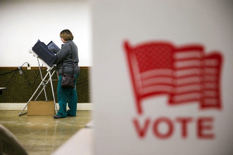 A voter casts her ballot in the primary election Tuesday, March 15, 2016, at an American Legion Hall in Marengo, Ohio. CREDIT: AP PHOTO/MATT ROURKE