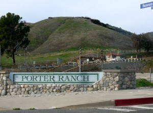 Beyond the gate, billions of cubic feet of natural gas are stored underground. Until recently, most Porter Ranch residents had no idea what was under that hill. CREDIT: Samantha Page/ThinkProgress
