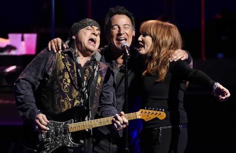 Bruce Springsteen, center, performs with Steven Van Zandt, left, and Patti Scialfa of the E Street Band during their concert at the Los Angeles Sports Arena on Tuesday, March 15, 2016, in Los Angeles. (Photo by Chris Pizzello/Invision/AP) CREDIT: PHOTO BY CHRIS PIZZELLO/INVISION/AP)