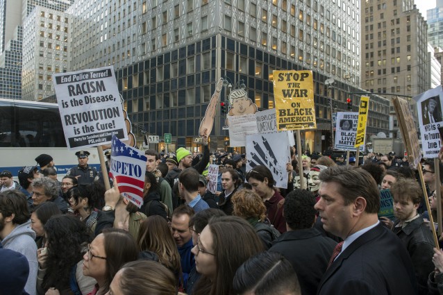 Protesters fill the streets during a protest and rally outside the New York State GOP Gala. CREDIT: AP Photo/Bryan R. Smith
