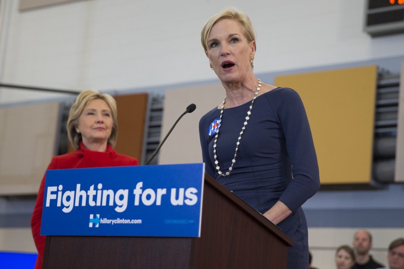 Planned Parenthood president Cecile Richards, right, introduces Clinton during a campaign rally at Burford Garner Elementary School, on Sunday, Jan. 24, 2016. CREDIT: AP PHOTO/EVAN VUCCI
