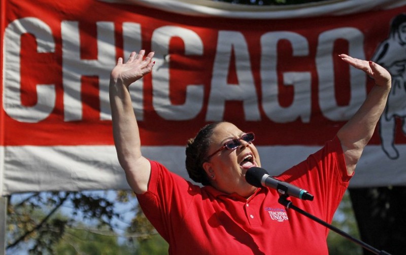 FILE — In this Sept. 15, 2012, file photo, Karen Lewis, president of the Chicago Teachers Union addresses the crowd during a rally. CREDIT: Charles Rex Arbogas, AP
