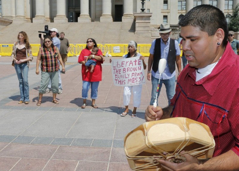 A 2013 rally in support of the biological father in the Adoptive Couple v. Baby Girl case CREDIT: AP Photo/Sue Ogrocki