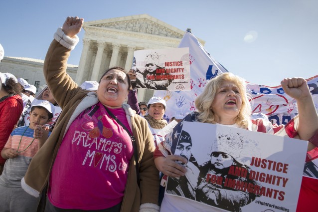 Immigration activists demonstrate at the Supreme Court CREDIT: AP Photo/J. Scott Applewhite
