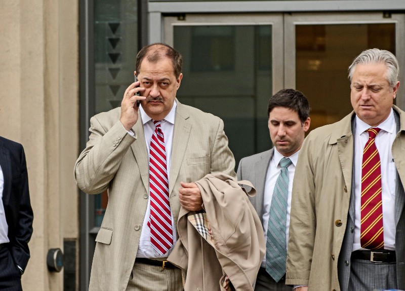 Former Massey Energy CEO Don Blankenship, left, makes his way out of the Robert C. Byrd U.S. Courthouse during a break in deliberations, Tuesday, Dec. 1, 2015, Charleston, W.Va. CREDIT: AP PHOTO/TYLER EVERT
