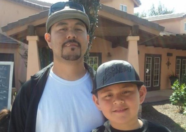 Mario Cruz with one of his two children CREDIT: Ebelia Cruz