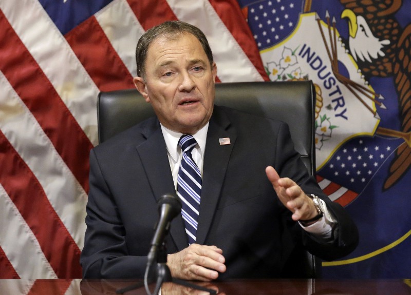 In this Feb. 17, 2016 file photo, Utah Gov. Gary Herbert speaks with reporters during a news conference at the Utah State Capitol, in Salt Lake City. CREDIT: AP PHOTO/RICK BOWMER