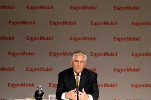 ExxonMobil CEO Rex Tillerson answers questions at a 2014 shareholders meeting. CREDIT: AP Photo/LM Otero