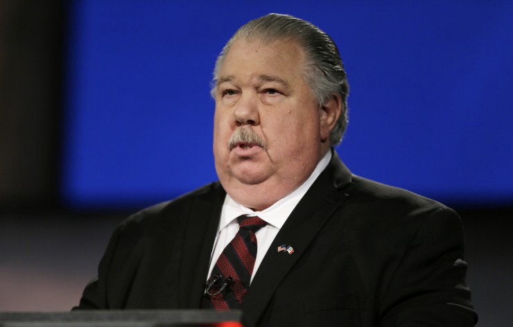Iowa Republican senatorial candidate college professor Sam Clovis looks on before a live televised debate at Iowa Public Television studios, Thursday, April 24, 2014, in Johnston, Iowa. CREDIT: AP Photo/Charlie Neibergall
