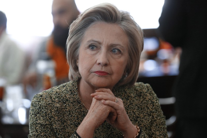 Democratic presidential candidate Hillary Clinton listens at Lincoln Square Pancake House during a campaign stop in Indianapolis, Sunday, May 1, 2016. CREDIT: AP PHOTO/PAUL SANCYA