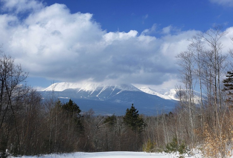 In this Jan. 28, 2011 photo, clouds hide the summit of Mount Katahdin in Baxter State Park, in this view from land owned by Roxanne Quimby in Township 3, Range 8, Maine. CREDIT: AP Photo/Robert F. Bukaty