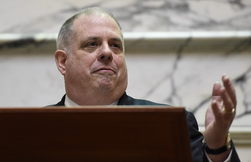 Less than two months after Maryland Gov. Larry Hogan signed a bill in support of reducing the state’s greenhouse gas emissions, he vetoed a plan to increase a mandate on renewable energy use. CREDIT: AP PHOTO/GAIL BURTON