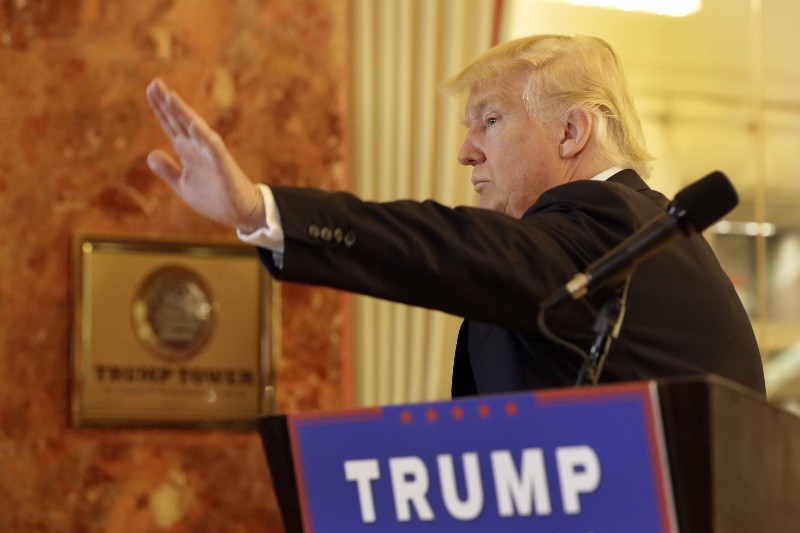 Republican presidential candidate Donald Trump waves as he leaves a news conference in New York, Tuesday, May 31, 2016. CREDIT: AP PHOTO/RICHARD DREW