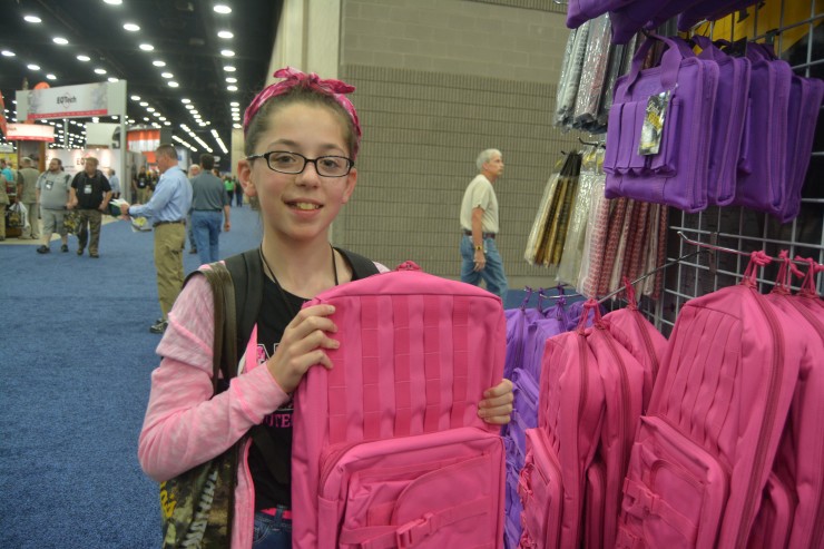 Ciara Palermo, 12, shopped for pink firearm cases for her automatic weapon.