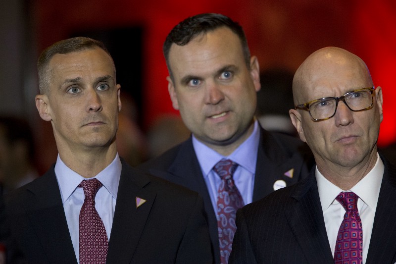 Republican presidential candidate Donald Trump campaign manager Corey Lewandowski, left, Dan Scavino, center, and Michael Glassner, watch as Ted Cruz ends his campaign, ahead of a primary night news conference by Trump, Tuesday, May 3, 2016, in New York. CREDIT: AP PHOTO/MARY ALTAFFER