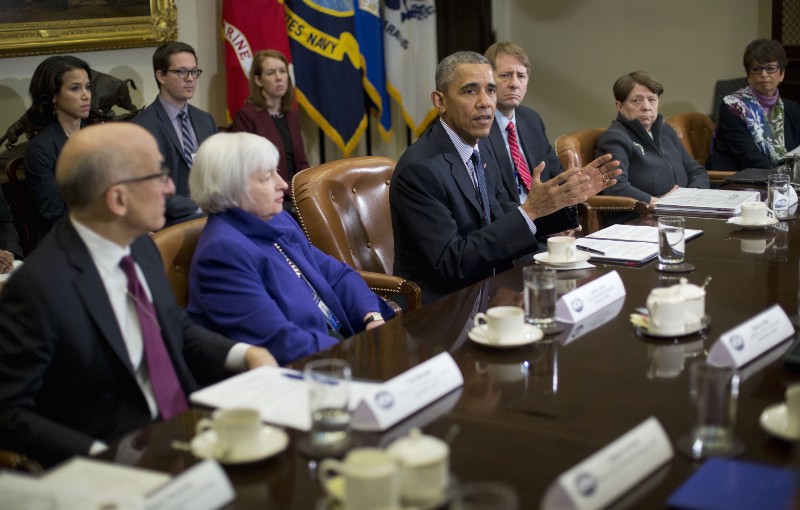 Consumer Financial Protection Bureau head Richard Cordray sits at President Obama’s left during a March 2016 meeting of the administration’s financial regulators. CREDIT: AP PHOTO/PABLO MARTINEZ MONSIVAIS