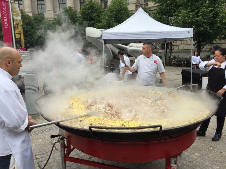 Chefs preparing paella at the Feeding the 5000 event in D.C. CREDIT: Natasha Geiling