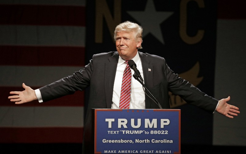 Republican presidential candidate Donald Trump gestures as he speaks during a campaign rally at the Greensboro Coliseum in Greensboro, N.C., Tuesday, June 14, 2016. CREDIT: AP PHOTO/CHUCK BURTON