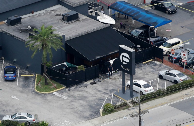 Law enforcement officials work at the Pulse Orlando nightclub following a fatal shooting Sunday, June 12, 2016, in Orlando, Fla. CREDIT: AP PHOTO/CHRIS O’MEARA