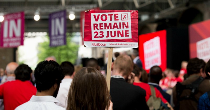 Someone holds up a sign during a European Referendum “Remain” rally in London, Wednesday, June 22, 2016. CREDIT: AP PHOTO/MATT DUNHAM