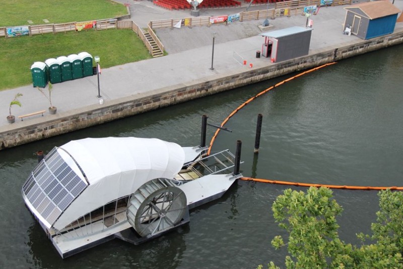The Inner Harbor Water Wheel, or “Mr. Trash Wheel” to locals, combines old and new technology to harness the power of water and sunlight to collect litter and debris flowing down the Jones Falls River. CREDIT: Waterfront Partnership of Baltimore