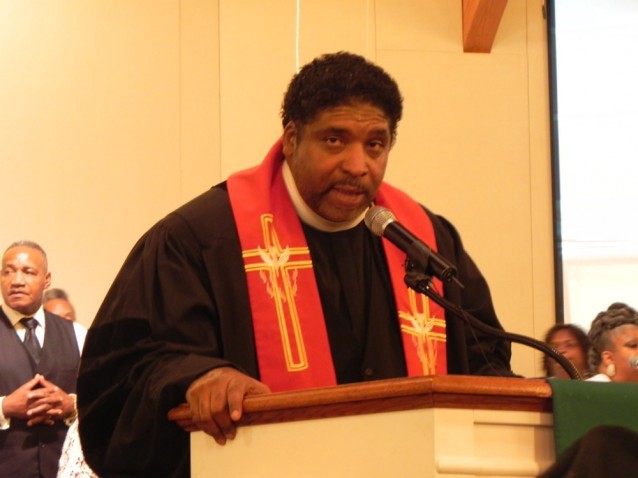 North Carolina NAACP President Reverend William Barber preaches at Union Baptist Church the night before the trial. CREDIT: Alice Ollstein