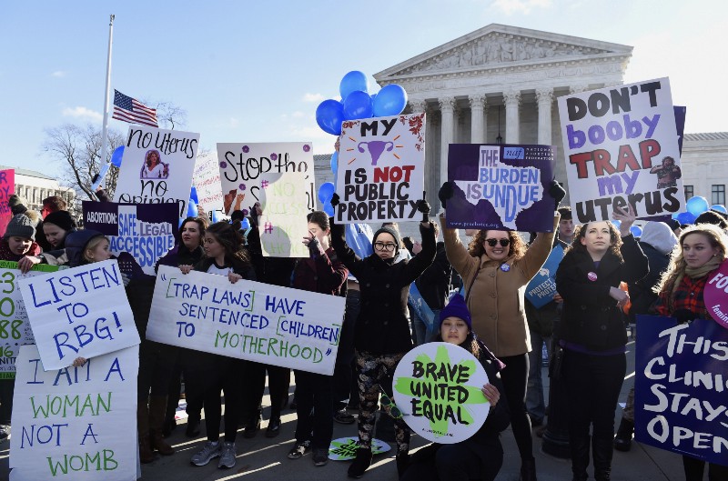 Pro-abortion rights protesters rally outside the Supreme Court in Washington CREDIT: AP PHOTO/SUSAN WALSH