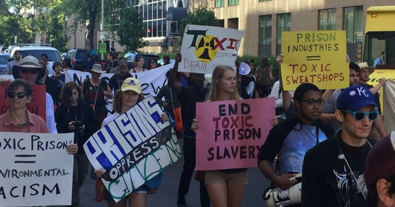 Protesters block traffic during march against toxic prisons. CREDIT: CARIMAH TOWNES