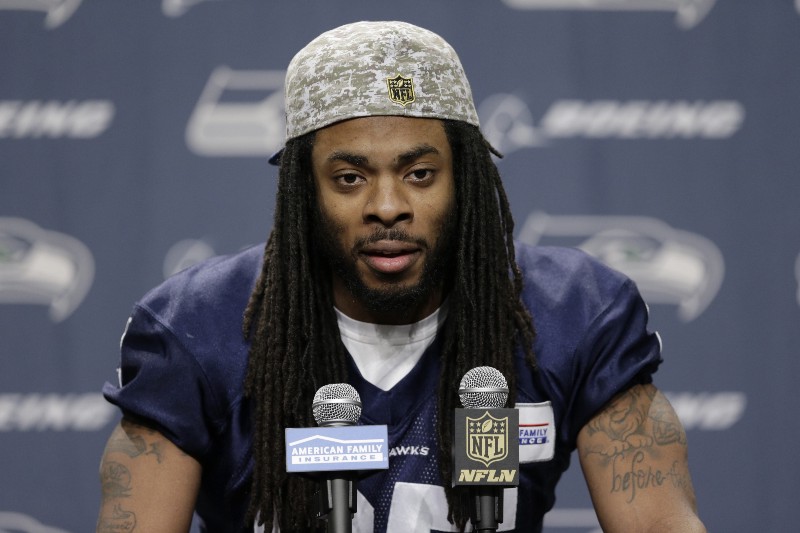 Seattle Seahawks cornerback Richard Sherman talks to reporters before NFL football practice, Wednesday, Jan. 6, 2016, in Renton, Wash. CREDIT: TED S. WARREN