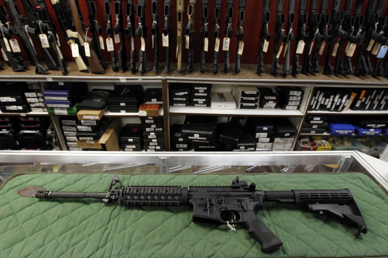 In this Thursday, July 26, 2012 file photo, an AR-15 style rifle is displayed at the Firing-Line indoor range and gun shop, in Aurora, Colo. CREDIT: AP PHOTO/ALEX BRANDON, FILE