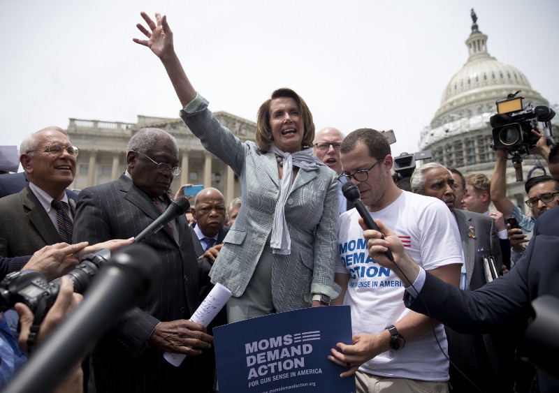 House Minority Leader Nancy Pelosi of Calif., center, joined by, from left, Rep. Paul Tonko, D-N.Y., House Assistant Minority Leader James Clyburn, of S.C., Rep. John Lewis, D-Ga., Rep. Joseph Crowley, D-N.Y., and Rep. Charles Rangel, D-N.Y., speaks on Capitol Hill in Washington, Thursday, June 23, 2016, after House Democrats ended their sit in protest on the House floor. CREDIT: AP PHOTO/CAROLYN KASTER