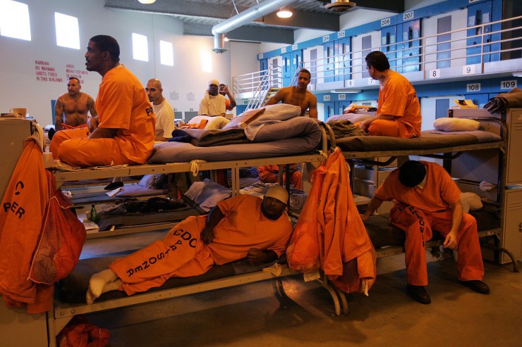 Inmates fill a converted dayroom, which is being used as temporary “emergency” sleeping area at California State Prison-Los Angeles County in Lancaster, Calif., Friday, March 2, 2007. CREDIT: AP Photo/Spencer Weiner