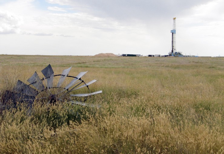 A rig drills an oil well for State College, Pa.-based Rex Energy about 15 miles east of Cheyenne on Aug. 4, 2010. CREDIT: AP Photo/Mead Gruver