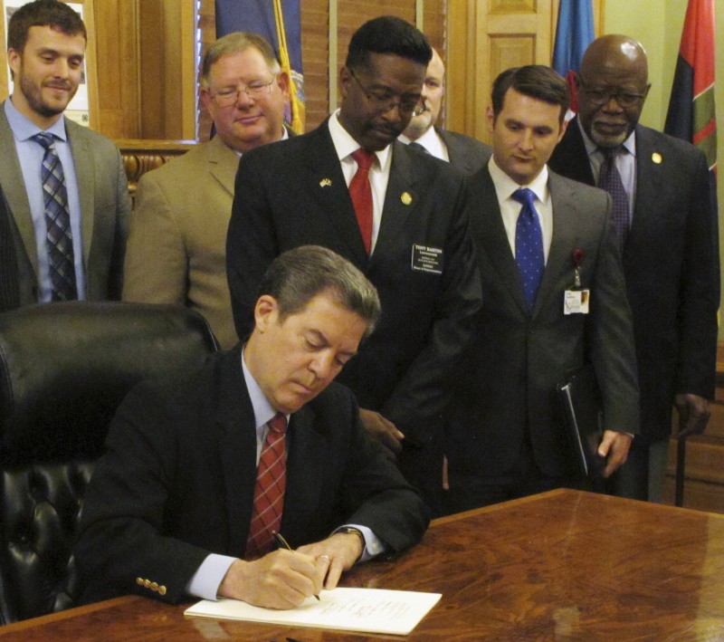 Kansas Gov. Sam Brownback (R) CREDIT: AP PHOTO/JOHN HANNA
