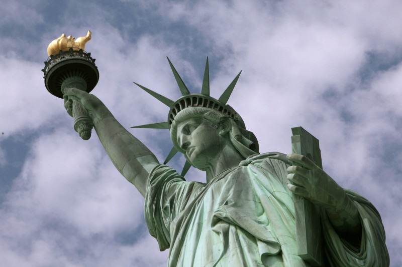In this June 2, 2009 photo, the Statue of Liberty is seen in New York harbor. The crown is set to open July 4 after being closed since shortly after the Sept. 11, 2001, terrorist attacks. (AP Photo/Richard Drew) CREDIT: AP PHOTO/RICHARD DREW