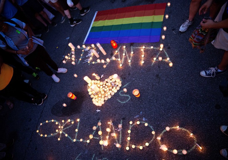 A message spelled out in candles is laid out at a vigil after a fatal shooting at an Orlando nightclub, Sunday, June 12, 2016, in Atlanta. CREDIT: AP Photo/David Goldman