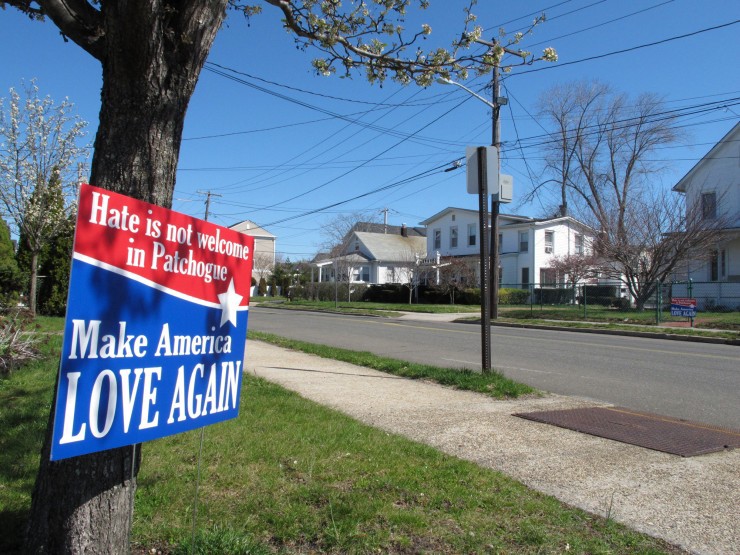 A sign sits near the site where Marcelo Lucero was killed in Patchogue, N.Y., on Wednesday, April, 13, 2016. The Rev. Alan Ramirez, an adviser to the family of Lucero, has called for Donald Trump to cancel a planned appearance at a Suffolk County Republican Committee fundraiser on Thursday, April 14, in Patchogue, because it is being held at a nightclub just blocks from where a gang of teenagers killed Lucero in November 2008. CREDIT: AP Photo/Frank Eltman
